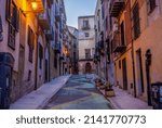 Small photo of Palermo, Italy - May 8, 2019: Narrow street in old part of Palermo city, Sicily Island