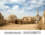 Small photo of Nefta, Tunisia - October 14, 2006: Remains of George Lucas Star Wars The Phantom Menace movie set of Mos Espa near Nefta town