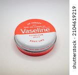 Small photo of Norwich, Norfolk, UK â€“ January 2022. Metal tin of Vaseline petroleum jelly specifically to prevent lips from drying out and cracking.
