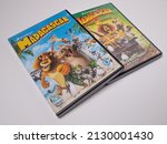 Small photo of Norwich, Norfolk, UK – February 2022. The DreamWorks Madagascar double DVD box set isolated on a plain white background