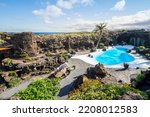 Amazing cave, pool, natural auditorium, salty lake designed by Cesar Manrique in volcanic tunnel called Jameos del Agua in Lanzarote, Canary Islands, Spain