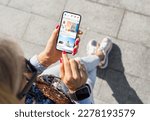 Woman using social media app on mobile phone
