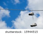Shoes Hanging From Power Line