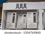 Small photo of Kokomo - Circa September 2019: Juul e-cigarette display. While e-cigarettes help people quit smoking, officials are alarmed at the skyrocketing use by teenagers, children and adolescents III