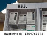 Small photo of Kokomo - Circa September 2019: Juul e-cigarette display. While e-cigarettes help people quit smoking, officials are alarmed at the skyrocketing use by teenagers, children and adolescents II