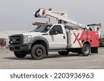 Small photo of Fishers - Circa September 2022: Xfinity branded Comcast bucket truck. Comcast owns NBCUniversal, Xfinity Internet and DreamWorks Animation.