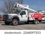 Small photo of Fishers - Circa February 2023: Xfinity branded Comcast bucket truck. Comcast owns NBCUniversal, Xfinity Internet and DreamWorks Animation.