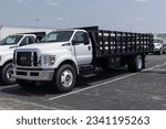 Small photo of Indianapolis - August 1, 2023: Ford F-750 Stake Bed Truck display at a dealership. Ford offers the F750 Stake Bed with a 7.3L V8 gas engine.