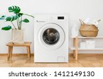 Clothes washing machine in laundry room interior