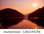Buckhorn Lake State Park, Buckhorn, Kentucky, USA, Fishermen in boat at sunset on Buckhorn Lake