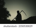Small photo of grim reaper, the death itself, scary horror shot of Grim Reaper holding scythe