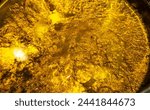Small photo of boiled Schnapps, moonshine, abstract background sun surface, traditional Romanian winter drink, boiled brandy