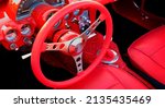 Detail of vintage red sportscar ...