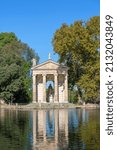 Small photo of Rome, Italy - October 10, 2020: Villa Borghese gardens, 18th century Temple of Aesculapius situated on the shore of the pond