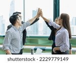 Small photo of group of students happy greeting with high five in relaxing place. woman and man standing, smiling, clash together. group of students studying and learning