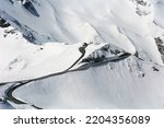 The famous Grossglockner mountain road leads throug snow-covered mountains. Hohe Tauern National Park. Great spring trip to Austria. Snow in May