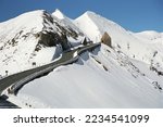 Great spring trip to Austria. Snow in May. The Grossglockner mountain road leads through flowering alpine meadows and snow-covered mountains. Hohe Tauern National Park. 