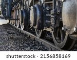 Small photo of Steam locomotive detail with cranks and wheels