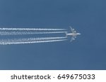 Plane at cruising altitude against blue sky