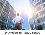 career concept, business background, man looking at office buildings