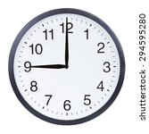 Small photo of Round office clock showing nine o'clock isolated on white background