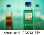 Small photo of Biofuel in chemical lab in glass bottle Biomass to Liquids (BTL)