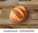 Small photo of French bread bakery on wooden table. Tabatiere, baguette, bagel, bread. pastry, pain au levain, petits pains ets. Taze mis gibi firindan pismis lezzetli mayali ekmek ahsap zemin masa vegan glutensiz
