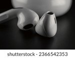 ROSTOV-ON-DON, RUSSIA - APRIL 28, 2018: Apple AirPods wireless Bluetooth headphones and charging case for Apple iPhone. New Apple Earpods Airpods in box.