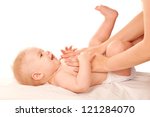 Baby Massage. Mother Massaging...
