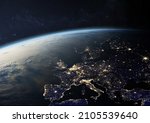 Planet Earth from the space at night. Europe with city lights in UK, Germany, France, Spain, Italy, Portugal, Austria, Greece, Turkey and other countries. Elements of this image furnished by NASA.