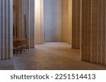 Small photo of Diminishing perspective view at the aisle vault corridor beside aisle seat at Grundtvig Church, iconic expressionist protestant church.