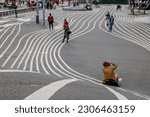Small photo of Selective focus and low angle view at white stripe pattern of outdoor exterior view at Superkilen park and The Black Square public park with outstanding design in Copenhagen, Denmark.