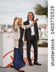 Small photo of CANNES, FRANCE - MAY 21, 2019: Amador Arias Mon and Benedicta Sanchez Vila attend the photocall for "Viendra Le Feu" during the 72nd annual Cannes Film Festival