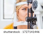 Small photo of Checking eyesight with Slit lamp, examination of the eyes in an ophthalmology clinic