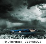 Old Boat In The Stormy Ocean