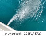 Small photo of Discharge of dirty waste water into the sea, water gushing out of the pipe, pollution water in sea concept