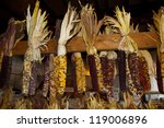 Bunches Of Indian Corn In Barn