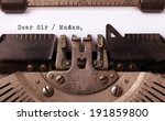 Small photo of Vintage inscription made by old typewriter, dear sir madam