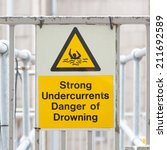 Small photo of Water hazard signs, strong undercurrents, danger of drowning