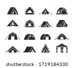 Camping tent silhouette set. Tourist tent with a canopy, reinforced with a rope with a peg, the shape of a nylon hemisphere dome, monochrome, a symbol of open travel and relaxation. Vector graphics.