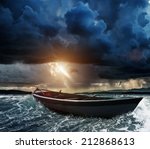 Wooden Boat In A Stormy Sea 