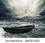 Abandoned Boat In Stormy Sea