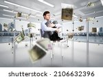 Small photo of scared businessman sitting on a chair with his hands clasped his knees. money is flying around