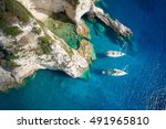 Sailboats in a beautiful bay, Paxos island, Greece