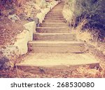  Wooden Steps Going Up A Hill...