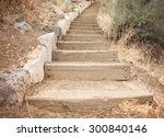 Wooden Steps Going Up A Hill...
