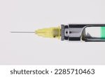 Small photo of Steel dental syringe for local anesthesia, isolated on white. Carpool syringe for anesthesia in dentistry. Thin needle on a syringe for anesthesia in dentistry.