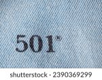 Small photo of Close up of the details of new LEVI'S 501 Jeans on the inside. label and stamp LEVI'S. Classic jeans model Levi Strauss on the underside of the textile. 31.12.2021, Rostov, Russia
