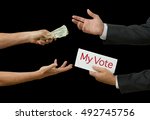 Politician taking bribe selling his vote for profit representing bribery, crooked politics, political favors, environmental destruction for money, corrupt world leader and more.