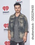 Small photo of LAS VEGAS - SEP 19 : Actor Michael Malarkey attends the 2015 iHeartRadio Music Festival at MGM Grand Garden Arena on September 19, 2015 in Las Vegas, Nevada.